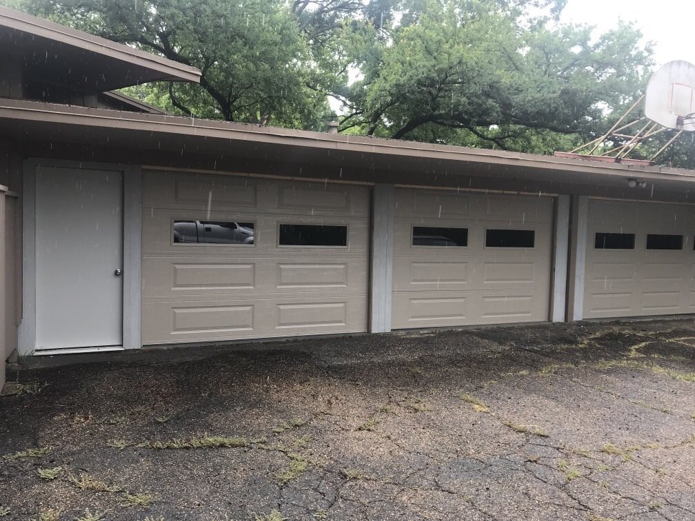 Residential carport after adding garage doors A1