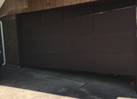 Broken garage door before