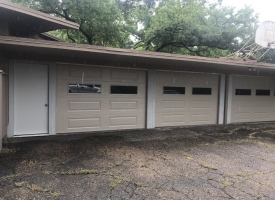 Residential carport after adding garage doors A1