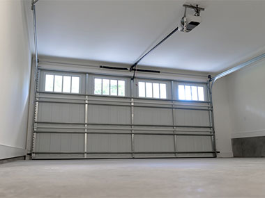 Inside of a Residential Garage in Fort Worth, TX after a Garage Door Track Replacement