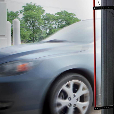 Car Entering Commercial Overhead Door with Garage Door Opener in Rowlett, TX