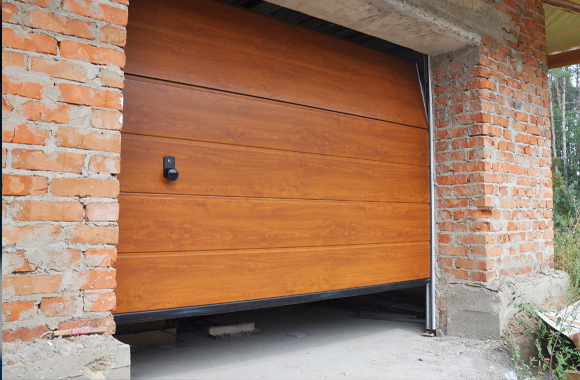 a brick and wood garage door showingcase Residential Garage Doors in Frisco, McKinney, Garland, TX, Fort Worth, Allen, TX, Plano